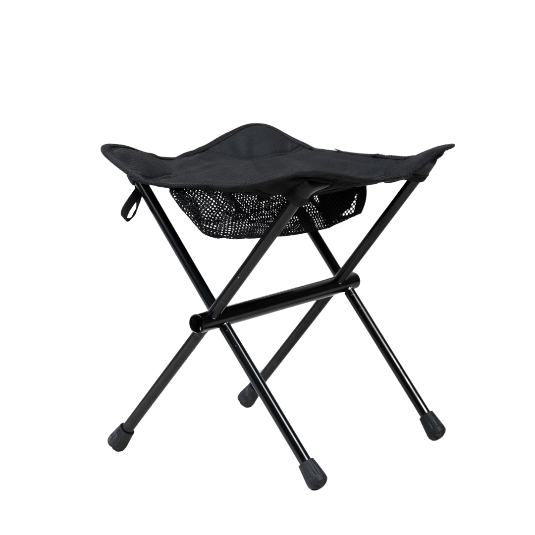 A black portable foot stool with metal frame and a fabric seat, designed for outdoor use.