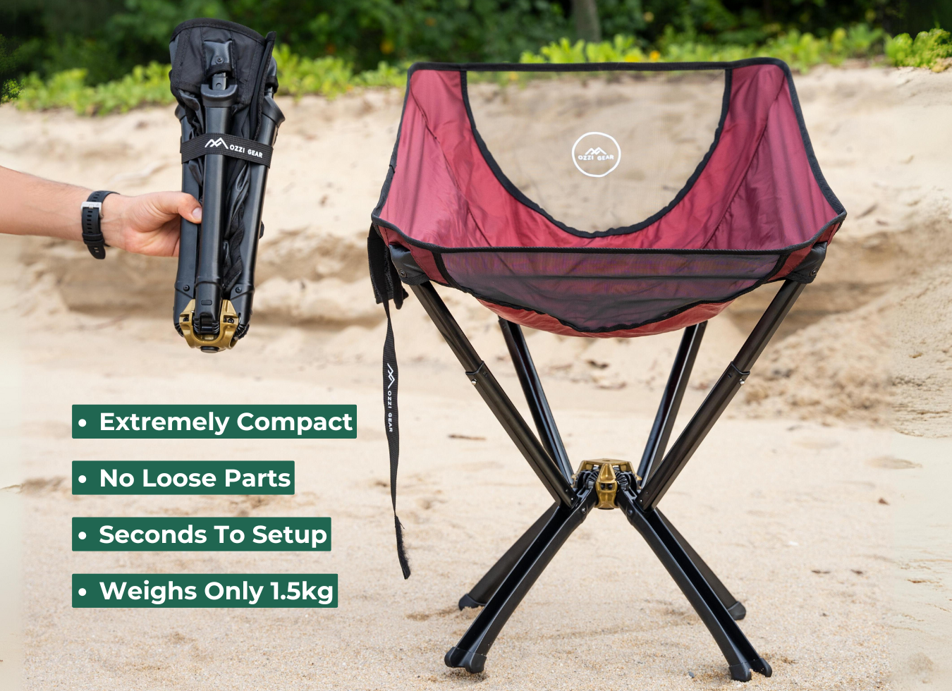 Red ozzi gear chair on beach with person holding folded up ozzi gear chair