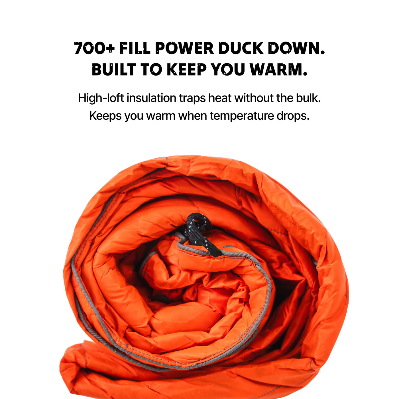 Ozzi Gear Puffy Hooded Blanket used as a wearable blanket at an outdoor event