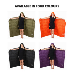 Ozzi Gear Puffy Hooded Blanket worn around a campfire for warmth
